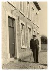 973 - Peter J. Schunck in front of the the house where he was born